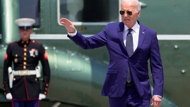 President Joe Biden waves as walks to board Air Force One at Andrews Air Force Base, Md., Monday, July 29, 2024, on his way to Austin, Texas, for the commemoration of the 60th Anniversary of the Civil Rights Act. (AP Photo/Manuel Balce Ceneta)