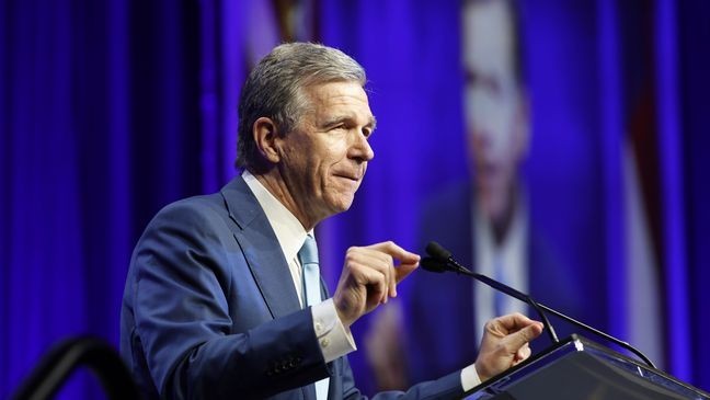 N.C. Gov. Roy Cooper speaks at the North Carolina Democratic Unity Dinner fundraiser in Raleigh, N.C., Saturday, July 20, 2024. (AP Photo/Karl B DeBlaker)