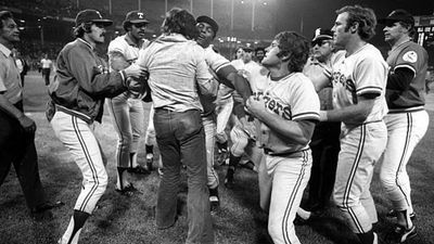 Image for story: Powder kegs: 50 years ago, 10-cent beers helped turn Texas Rangers game into a bloody riot