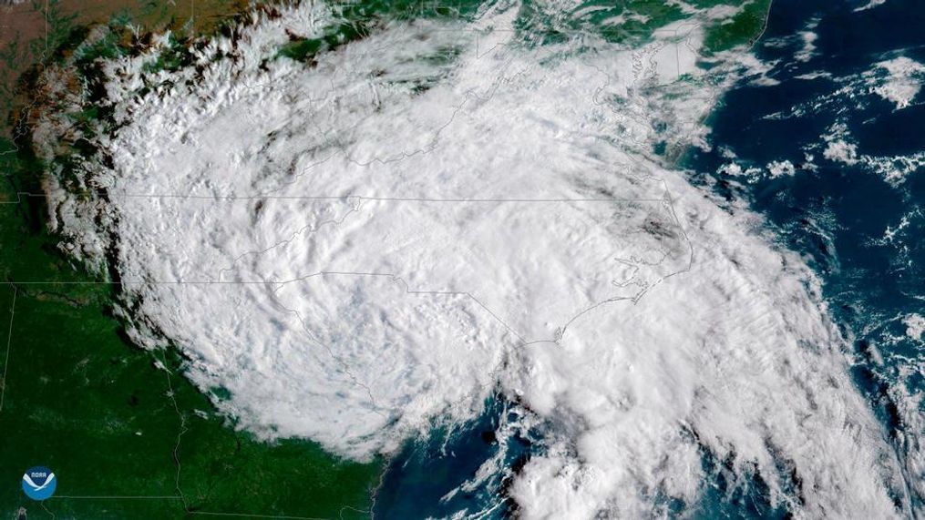 This satellite image provided by NOAA shows Tropical Depression Florence moving west across the United States on Sunday, Sept. 16, 2018. (NOAA via AP)