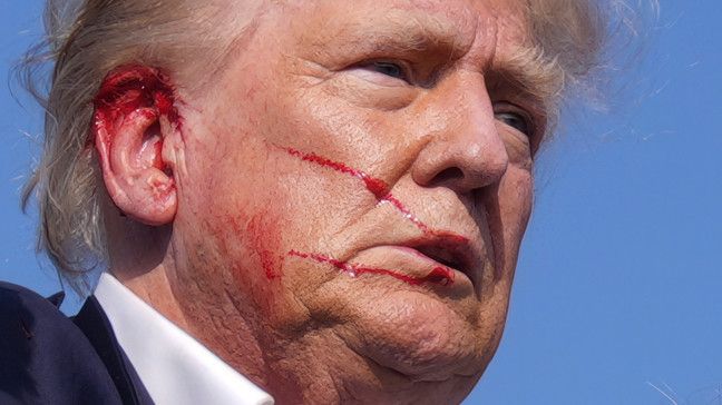 Republican presidential candidate former President Donald Trump is moved from the stage at a campaign rally, Saturday, July 13, 2024, in Butler, Pa. (AP Photo/Evan Vucci)