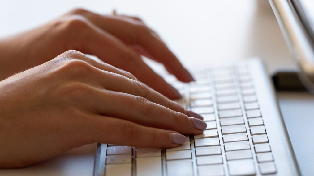 A person types on a keyboard on Thursday, June 6, 2024, in Portland, Ore. (AP Photo/Jenny Kane)